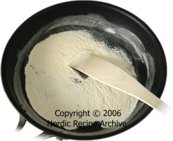Pour flour in skillet