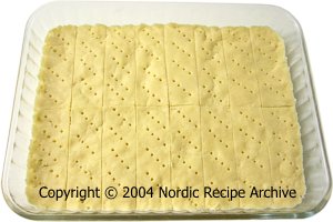 Butter cookie dough pressed into a pan