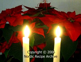 Candles and poinsettias