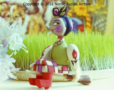 Easter witch riding a broom