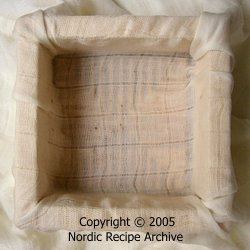 Cheese mould lined with cheesecloth Cheese mould lined with cheesecloth