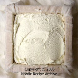 Cheese mould filled with curd Cheese mould filled with curd