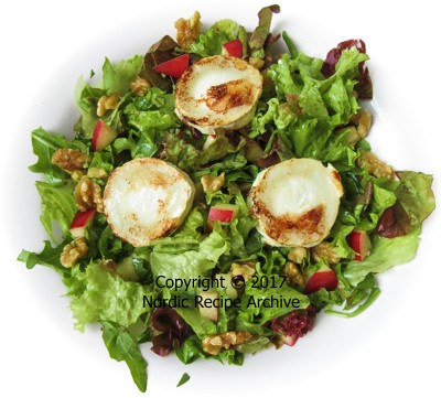 Salad of fresh greens, goat cheese and walnuts